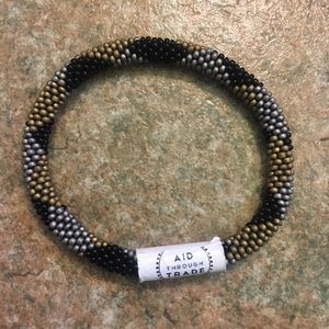 Aid Through Trade Roll on Bracelet
